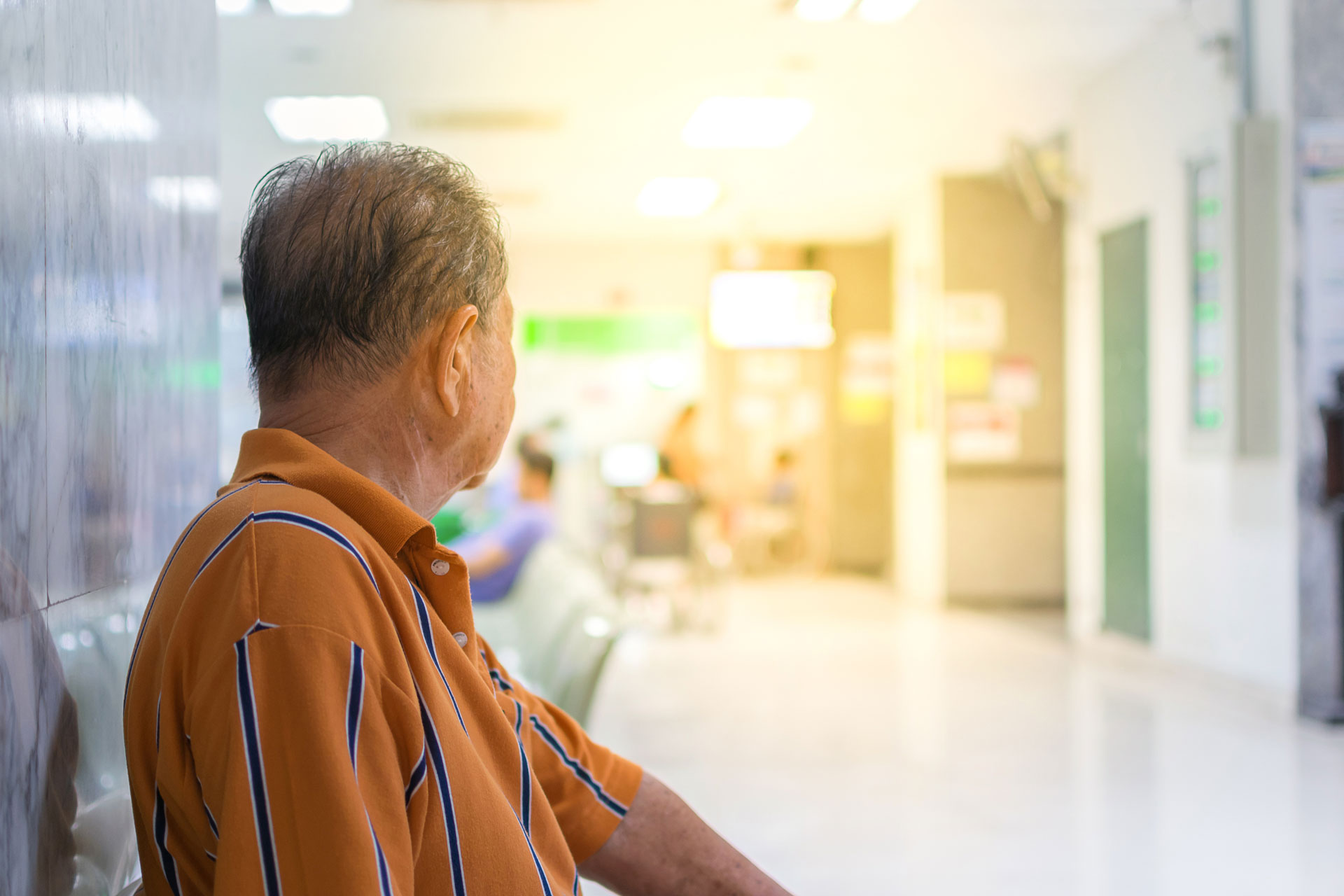 Patient sits in hospital awaiting appointment