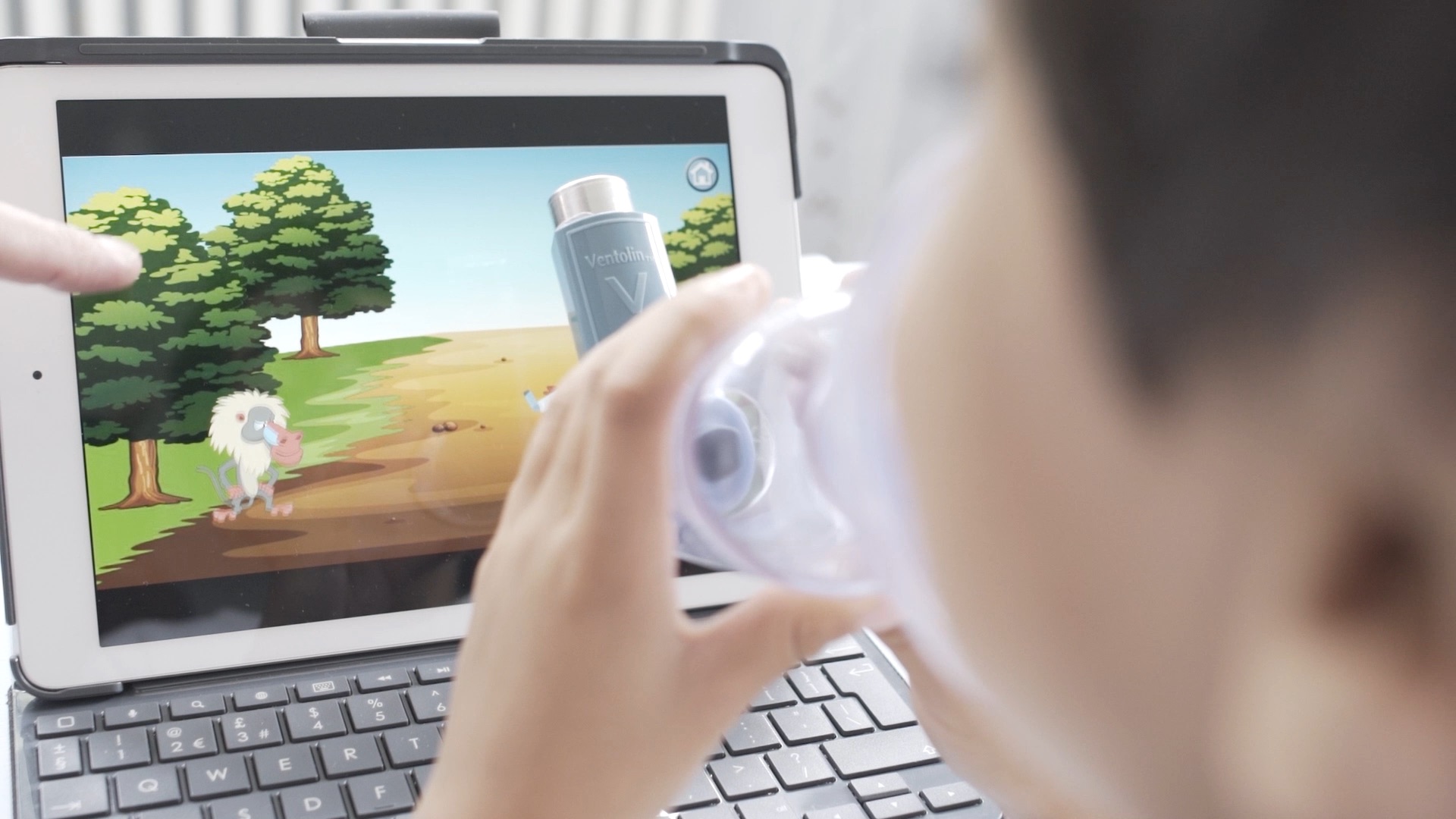 A child uses an inhaler with Raif-Tone app game developed by Clin-e-cal.
