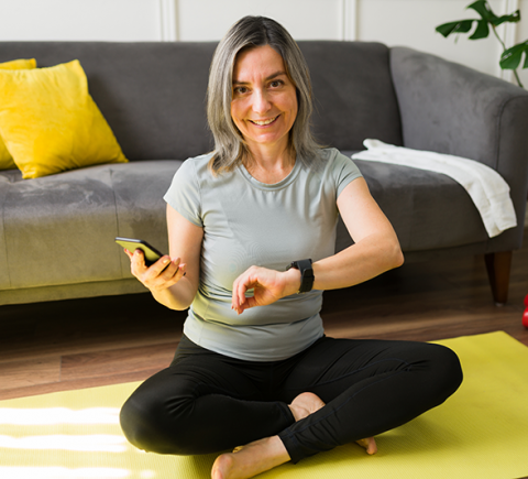 Older woman with tech exercising - Innovation Factory