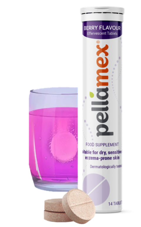 glass with pink liquid in it nex to a tube of 'pellamex'