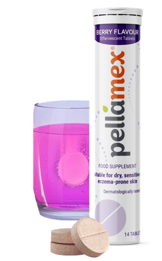 glass with pink liquid in it nex to a tube of 'pellamex'